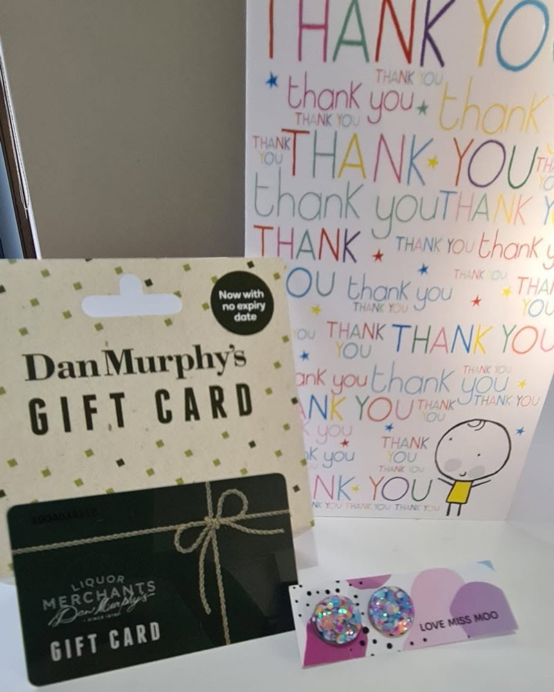 A thank-you card, a Dan Murphy’s gift card and a pair of earrings, left for Dale by a customer