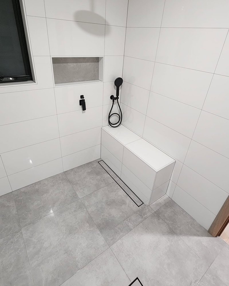 Walk-In Shower With Seat — Coastline Plumbing & Bathrooms